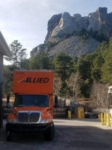 North Western Moving Company Allied Van Lines Moving Truck with Mount Rushmore in Background